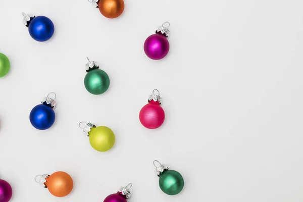 Festive Christmas baubles on a plain white background — Stock Photo, Image