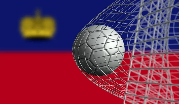 足球在对列支敦士登国旗的比赛中在网中攻入一球。3 — 图库照片