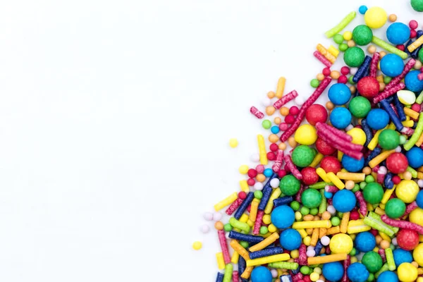 Colourful candy cake decorative sprinkles background — Stock Photo, Image