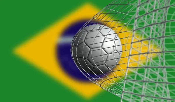 A bola de futebol marca um gol em uma rede contra a bandeira do Brasil. 3D Rende — Fotografia de Stock