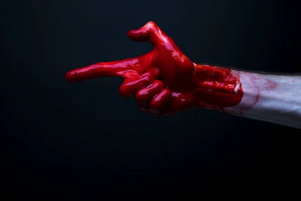 Ματωμένο χέρι σε σκοτεινό φόντο. Απόκριες τρόμου ιδέα — Φωτογραφία Αρχείου