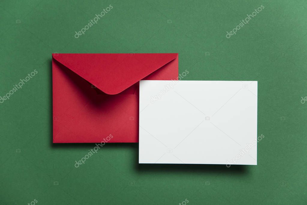 Blank white card with red paper envelope Christmas card template