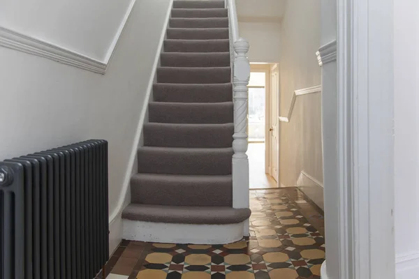 House entrance hall with period feature victorian tiles