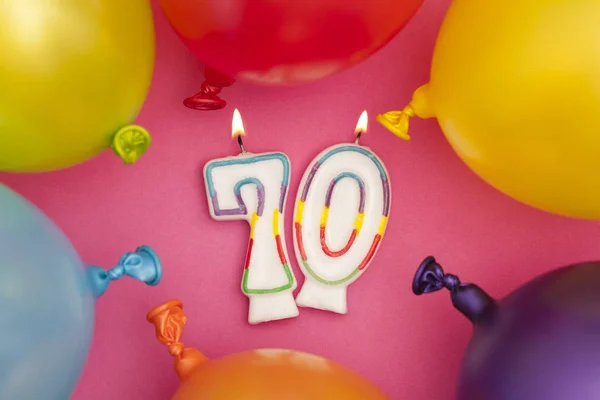 生日快乐号70庆祝蜡烛与五颜六色的球 — 图库照片