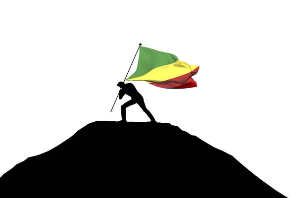 Republic of Congo flag being pushed into mountain top by a male — Stock Photo, Image