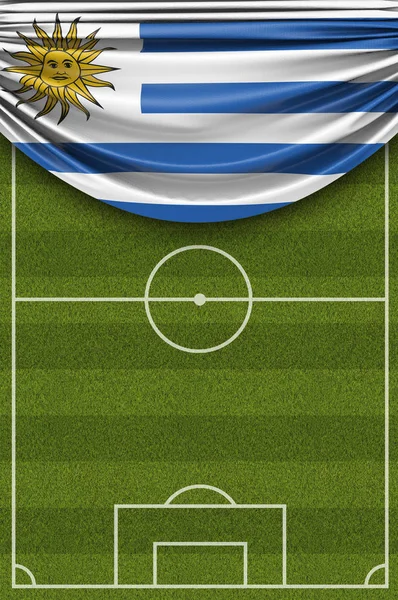 Drapeau de l'Uruguay drapé sur un terrain de football. 3D Ren — Photo