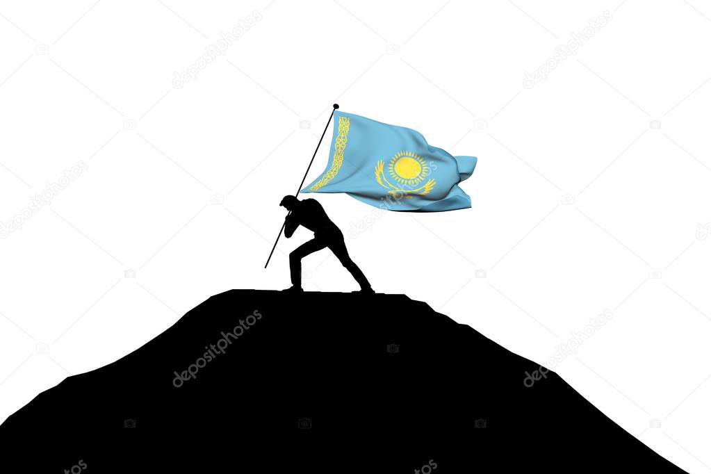 Kazakhstan flag being pushed into mountain top by a male silhoue