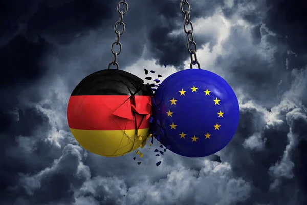 Немецкий флаг и политические шары Европейского союза врезаются в каждый о — стоковое фото