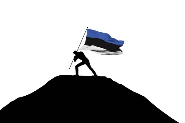 Bandeira da Estônia sendo empurrada para o topo da montanha por uma silhueta masculina — Fotografia de Stock