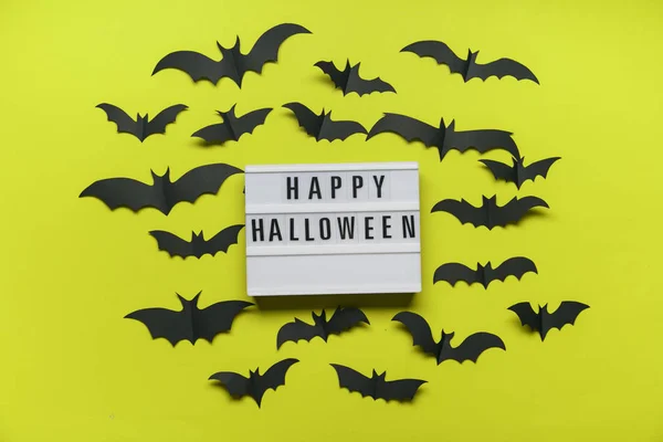Happy Halloween lightbox message with black scary bats