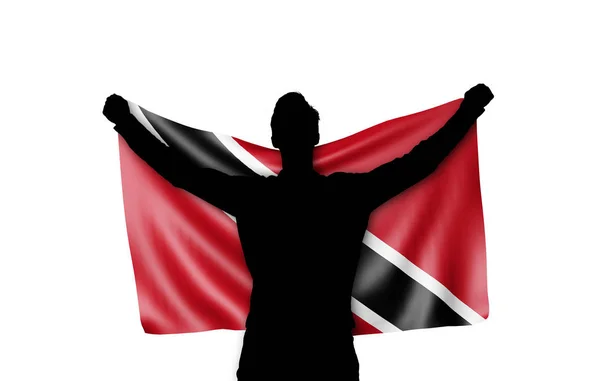 Sílhueta masculina segurando a bandeira nacional de Trinidad. Renderização 3D — Fotografia de Stock