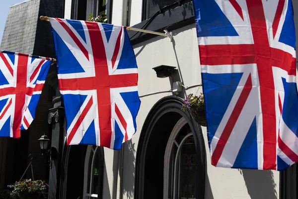 Union Jack flags hang in Windsor in preperation for the royal we — Stockfoto