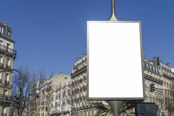 Blank white billboard sign in a city