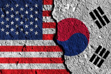 Amerika ve Güney Kore bayrakları arasındaki çatlak. siyasi ilişkiler