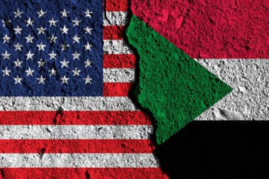 Amerika ve Sudan bayrakları arasındaki çatlak. siyasi ilişki ortaklığı