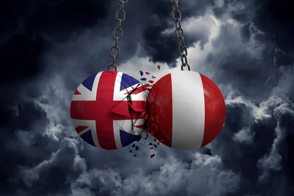 Storbritannien och Peru flagga politiska bollar krossa i varje oth — Stockfoto