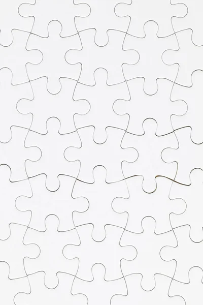 White jigsaw puzzle pieces background. Business solution concept — Stock Photo, Image