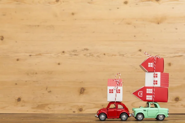 LONDON, UK - JANUARY 19th 2018: A toy oy car carrying a stack of — Stock Photo, Image