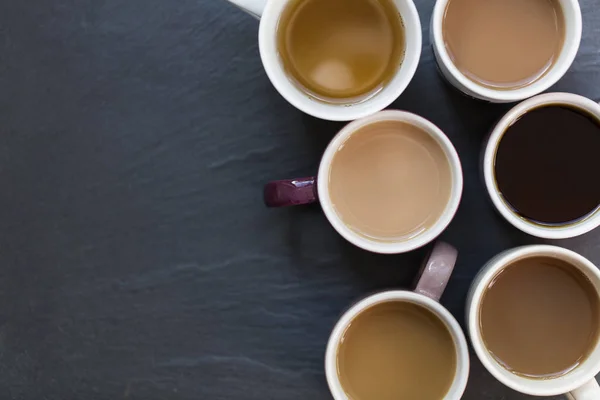 Fondo de varias bebidas calientes de té y café — Foto de Stock