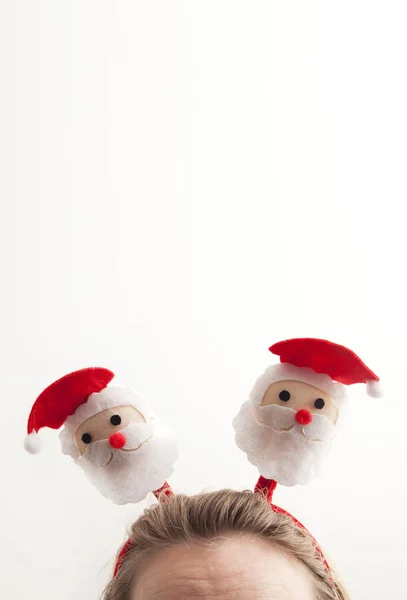 Festive christmas Santa headband on a female head — Stock Photo, Image