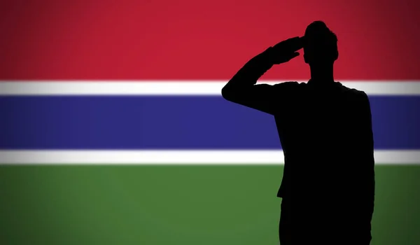 Egy Katona Sziluettje Aki Gambiai Zászló Előtt Tisztelegett — Stock Fotó