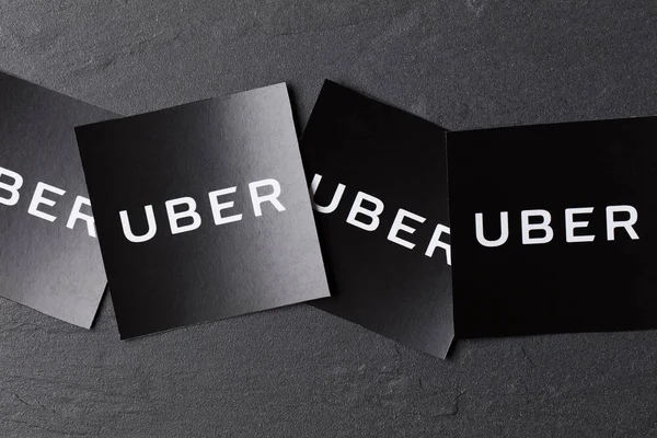 A photograph of  the Uber logo. Uber is a popular taxi style tra — 스톡 사진