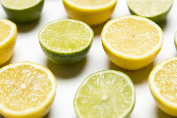 Lemon and lime background. Slices of fresh lemon and lime