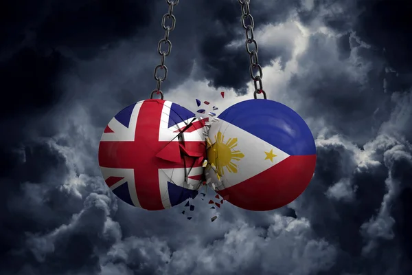 Reino Unido y Filipinas bandera política bolas smash en e — Foto de Stock