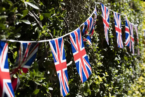 Union Jack flags hang in Windsor in preperation for the royal we