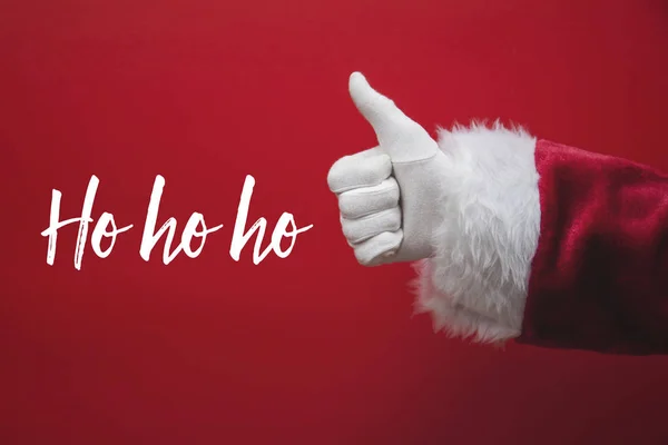 Święty Mikołaj kciuki do góry z świąteczną wiadomością — Zdjęcie stockowe