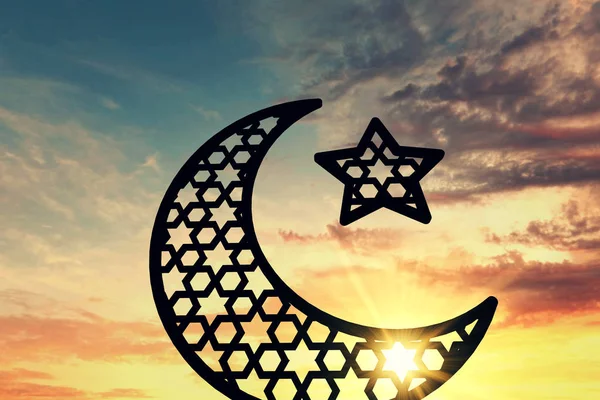 Ramadam Kareem moon and star against sunrise/sunset background. — Stock Photo, Image