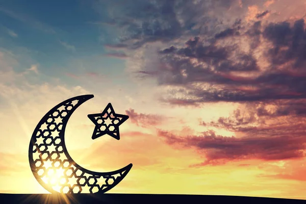 Ramadam Kareem moon and star against sunrise / sunset background . — стоковое фото