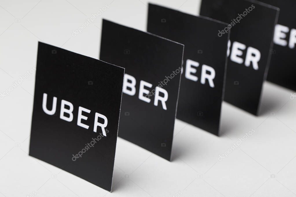 London, UK - MARCH 23rd 2017: A photograph of the Uber logo. Uber is a popular taxi style transport service application, founded in 2009