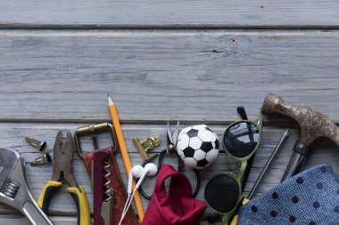 Overhead view of mens accessories on a wooden backgroun. Father'