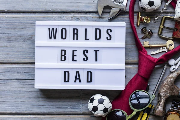Worlds best dad, Father\'s Day lightbox message. Overhead view