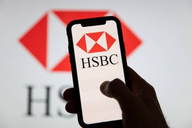LONDON, UK - June 2020: HSBC financial banking logo on a smartphone clipart