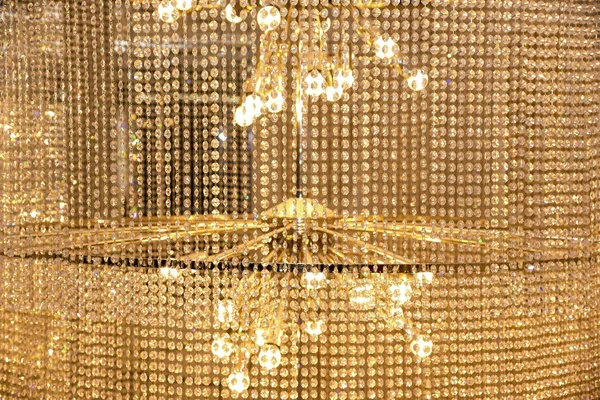 Contemporary Crystal Chandelier. Close up on the crystal of a contemporary chandelier. Glamour background with copy space