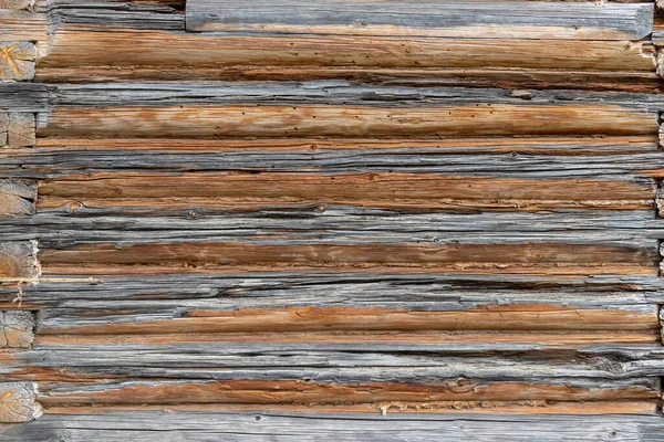 Texture of wooden barn wall made with weathered planks