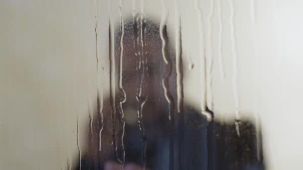 Business Man Making Phone Call Trough Raining Window — стоковое видео
