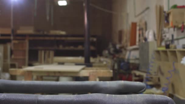 Closeup Young Man Furniture Factory Who Puts Together One Part — Stock Video