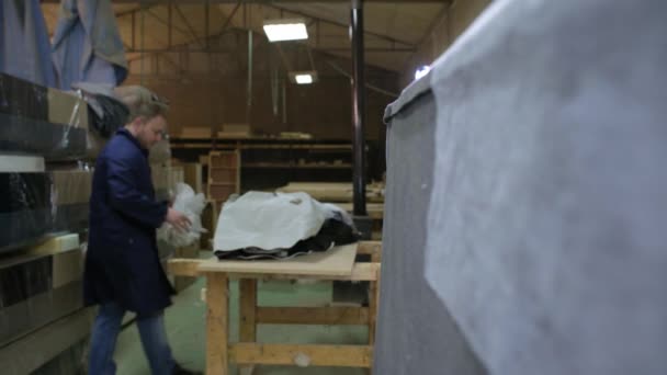 Process Furniture Production Young Man Dark Coat Applies Foam Wooden — Stock Video