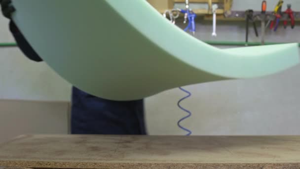 Process Furniture Production Young Man Dark Coat Applies Foam Wooden — Stock Video