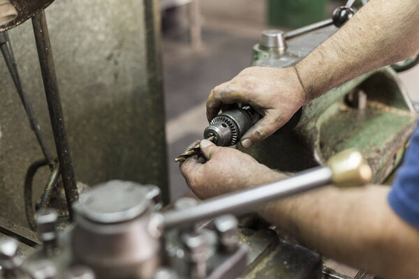 Lathe for metal material processing