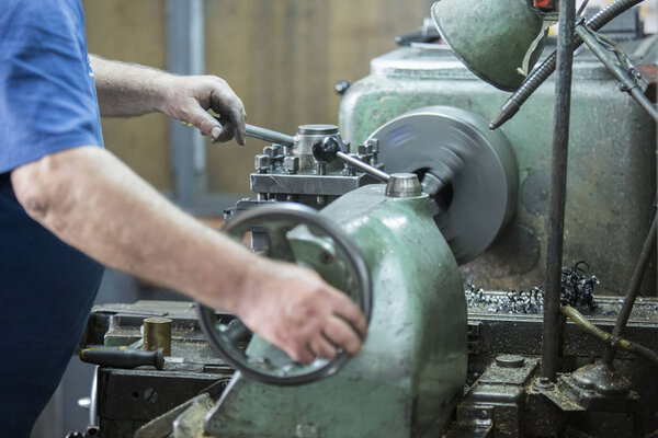 Lathe for metal material processing