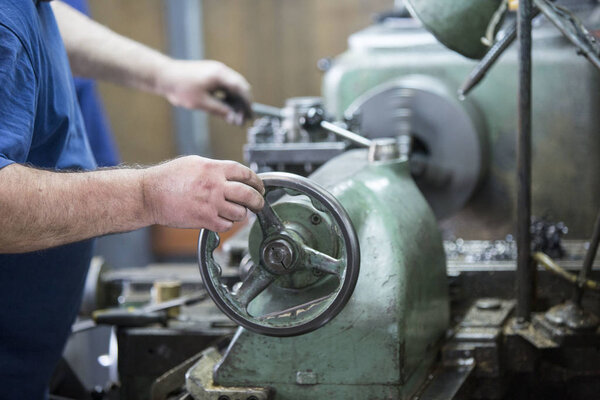 Lathe for metal material processing