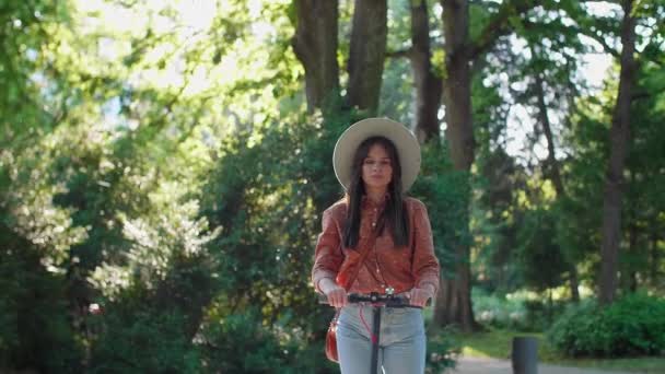 Young Beautiful Woman Hat Spending Sunny Spring Day Park Riding — Stock Video