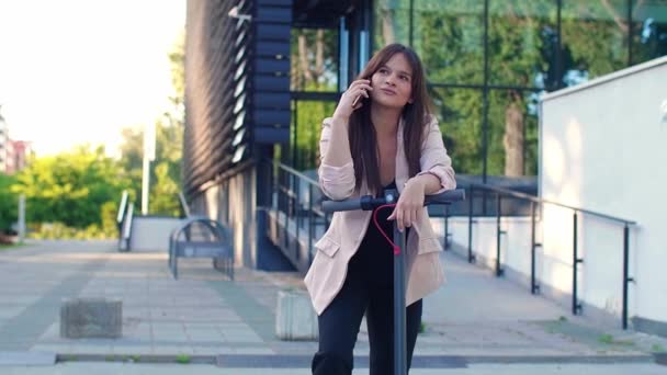 Young Beautiful Woman Standing Next Electric Scooter While Using Her — Stock Video