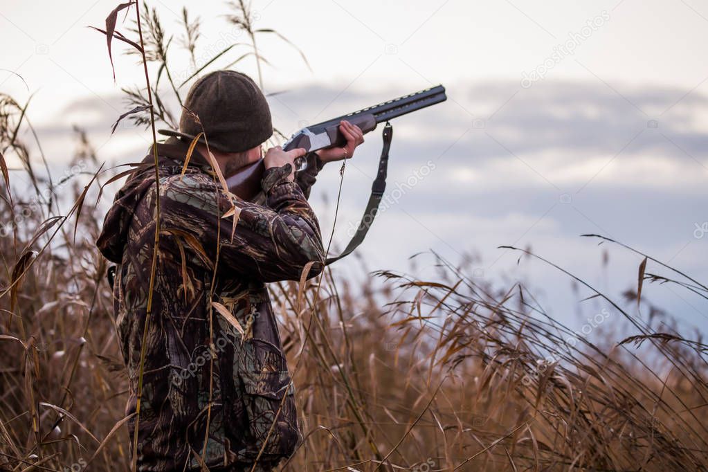 Hunter shooting in the field