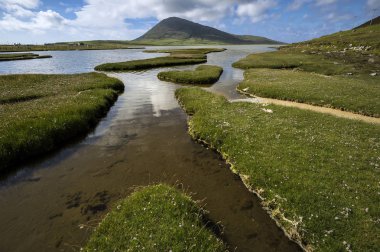 Ceapabhal hill and tidal inlets or saltings at An Taobh Tuath or Northton on the Isle of Harris, Scotland. clipart