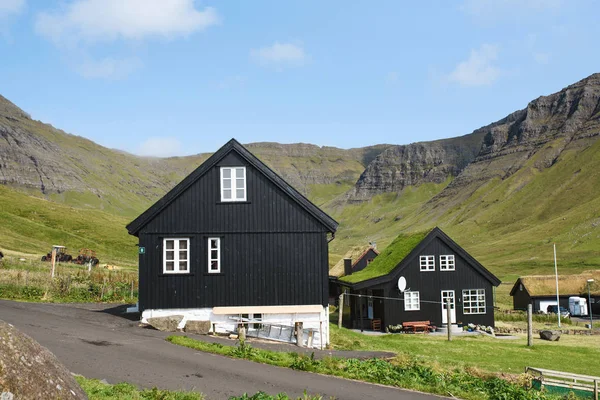 houses in mountain green valley village in Saksun